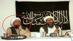 Ayman al-Zawahri, left, listens during a news conference with Osama bin Laden in Khost, Afghanistan in 1998.