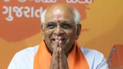 Gujarat Chief Minister Bhupendra Patel, greets the audience after his swearing in ceremony in Gandhinagar, India, Monday, Dec. 12, 2022.