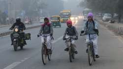 School children ride cycles to their school during a cold and foggy morning in New Delhi (Representational image)