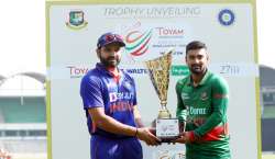 Rohit Sharma and Litton Das pose for the ODI series trophy ahead of the 1st ODI.