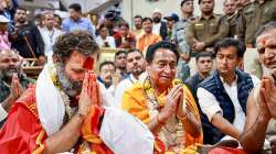 Congress leader Rahul Gandhi with party leader Kamal Nath offers prayers at the Mahakaleshwar temple in Ujjain.