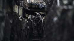 A Ukrainian soldier stands in a trench at a frontline position near Maryinka, Donetsk region, Ukraine.