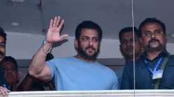 Salman Khan greets fans gather outside Galaxy Apartment