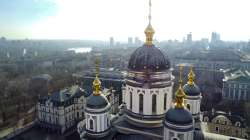 A hole from a shell explosion in the damaged dome of an Orthodox church is seen after what Russian officials in Donetsk said was a shelling by Ukrainian forces, in Donetsk, the capital of Russian-controlled Donetsk region, eastern Ukraine