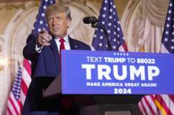 Former President Donald Trump gestures as he announces he is running for president for the third time as he speaks at Mar-a-Lago in Palm Beach.