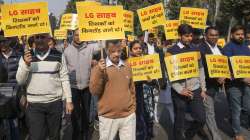 Delhi Chief Minister Arvind Kejriwal with Deputy Chief Minister Manish Sisodia and other AAP MLAs during a protest march towards Delhi Lieutenant Governor VK Saxenas office over his alleged interference in the working of the city government, in New Delhi.