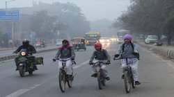 School children ride cycles to their school during a cold and foggy morning in New Delhi. (Representational image)