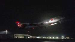 A repurposed Virgin Atlantic Boeing 747 aircraft, named Cosmic Girl, carrying Virgin Orbit's LauncherOne rocket, takes off from Spaceport Cornwall at Cornwall Airport, Newquay, England. 