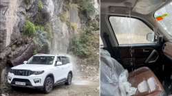 Man takes Mahindra Scorpio N SUV under waterfall