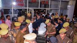 Police personne at SRN hospital after Umesh Pal, key witness in Raju Pal murder case, was shot at his residence.