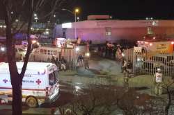 Image taken from a video showing ambulances and rescue teams staffers outside an immigration center in Ciudad Juarez