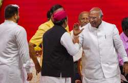 SP Chief Akhilesh Yadav along with Congress leader Mallikarjun Kharge
