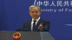  Chinese Foreign Ministry spokesperson Wang Wenbin gestures during a media briefing at the Ministry of Foreign Affairs office in Beijing.