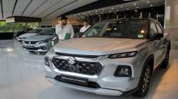 Cars on display at a Maruti Suzuki showroom.