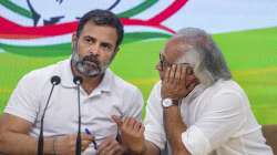 Congress leader Rahul Gandhi with party leader Jairam Ramesh during a press conference at AICC headquarters in New Delhi.