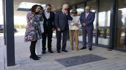 President Joe Biden stands with his son Hunter Biden and sister Valerie Biden Owens, second from right, as he looks at a plaque dedicated to his late son Beau Biden while visiting Mayo Roscommon Hospice.