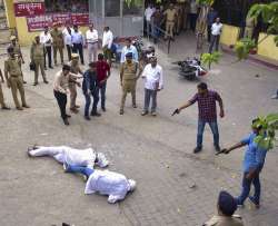 Special Investigation Team (SIT) and the forensic team recreate the crime scene, where three assailants shot dead gangster-turned-politician Atiq Ahmed and his brother Ashraf in Prayagraj