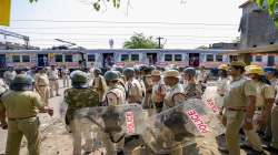 Security personnel deployed near Rishra railway station amid tension after clashes broke out between two groups during a Ram Navami procession on Sunday, in Hooghly district, West Bengal