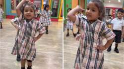 Little girl dances in school