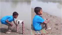 Little boy's unique fishing technique