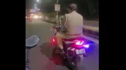 UP cops fined for riding without wearing helmet.