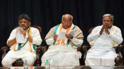 Congress President Mallikarjun Kharge with former Karnataka CM Siddaramaiah and Karnataka Congress President D.K. Shivakumar during celebrations after the partys win in Karnataka Assembly elections.