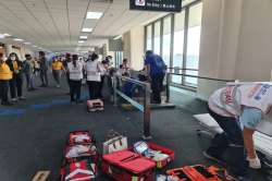 The woman's leg was trapped at the end of the walkway at Don Muaeng International Airport, Bangkok.