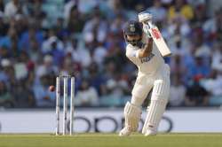 Virat Kohli with his cover drive