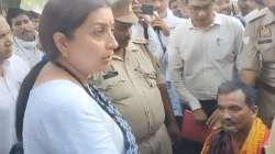 Smriti Irani with the man who escaped unhurt