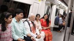 PM Modi travels in Delhi metro to attend the centenary celebrations of Delhi University | WATCH