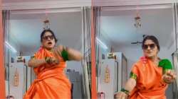 Aunty wearing saree & goggles grooves to English song