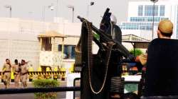 Saudi special forces gather outside the US consulate in Jeddah in 2004, after an attack on the building.
