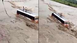 Bus gets stuck in river in UP's Bijnor, stranded passengers scream for help | WATCH