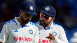 India captain Rohit Sharma and Mukesh Kumar during Day 3's play in Port of Spain