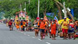 Lord Shiva devotees or Kanwarias carry holy water during Kanwar Yatra in the month of Shravan.