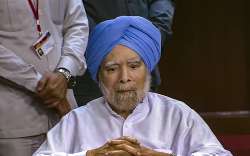 Former prime minister Manmohan Singh attends proceedings in the Rajya Sabha during the Monsoon session of Parliament, in New Delhi