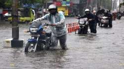 Some dwelling houses in Kamalanagar-IV area were fully submerged, officials said.