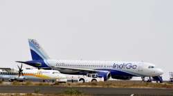 Man tries to open Guwahati Agartala Indigo flight emergency door, man detained mid air, Guwahati Aga