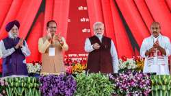 Prime Minister Narendra Modi with Union Minister Hardeep Singh Puri and Madhya Pradesh Chief Minister Shivraj Singh Chouhan 