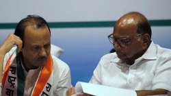 Nationalist Congress Party Chief Sharad Pawar and Maharashtra Deputy CM Ajit Pawar (Right)