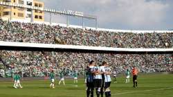 Argentina players in a team huddle