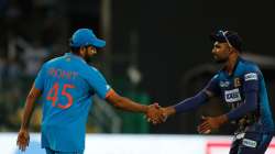 Rohit Sharma shakes hands with Dasun Shanaka