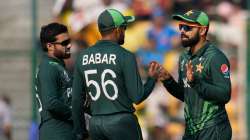 Pakistan captain Babar Azam during discussion with wicketkeeper batter Mohammad Rizwan and Shadab Khan