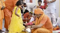 Uttar Pradesh Chief Minister Yogi Adityanath during Kanya Puja on Navami 