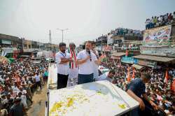 Congress leader Rahul Gandhi with Telangana Congress President Revanth Reddy during a rally ahead of State Assembly elections, at Kataram in Bhupalpally district.