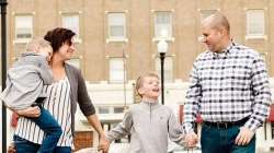 Doug Larsen, his wife and two children 