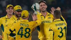 Australian cricket team celebrates a wicket at the Arun Jaitley Stadium.