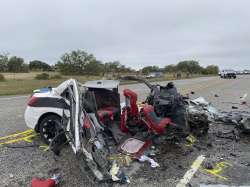 This image provided by the Texas Department of Public Safety, shows mangled vehicles at the scene of crash