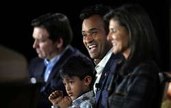 Indian American presidential aspirant Vivek Ramaswamy with his son and GOP rivals at 'The Family Leader' forum.