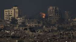 An explosion is seen following an Israeli bombardment in the Gaza Strip, as seen from southern Israel. 